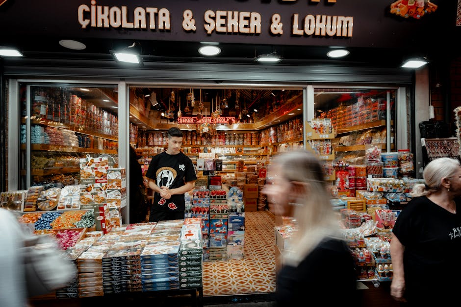 Vibrant scene of a bustling Turkish candy shop in Istanbul's famous bazaar, showcasing a variety of sweets.