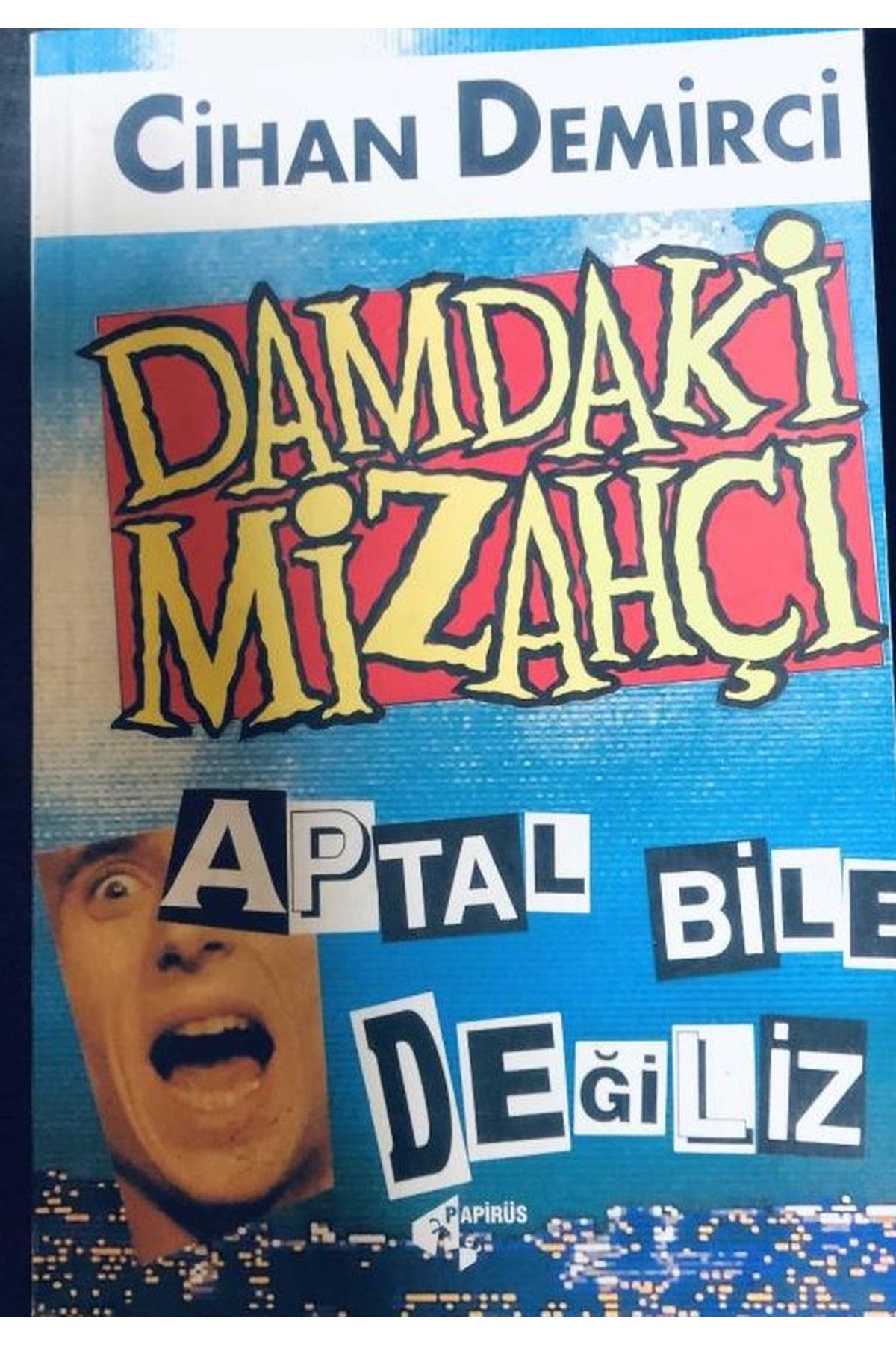 Damdaki Mizahçı - Aptal Bile Değiliz / Cihan Demirci (1996 Basım-Sıfır Kitap) - CİHAN DEMİRCİ kitap kapağı