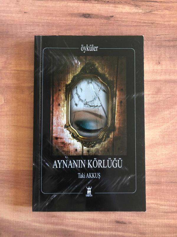 Aynanın Körlüğü - Taki Akkuş kitap kapağı