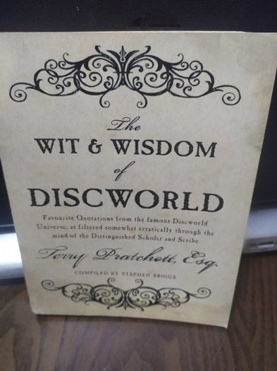 The Wit And Wisdom Of Discworld - Stephen Briggs, Terry Pratchett kitap kapağı