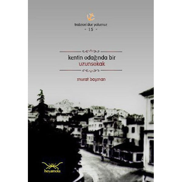 Kentin Odağında Bir Uzunsokak | Heyamola Yayınları (Ciltsiz)