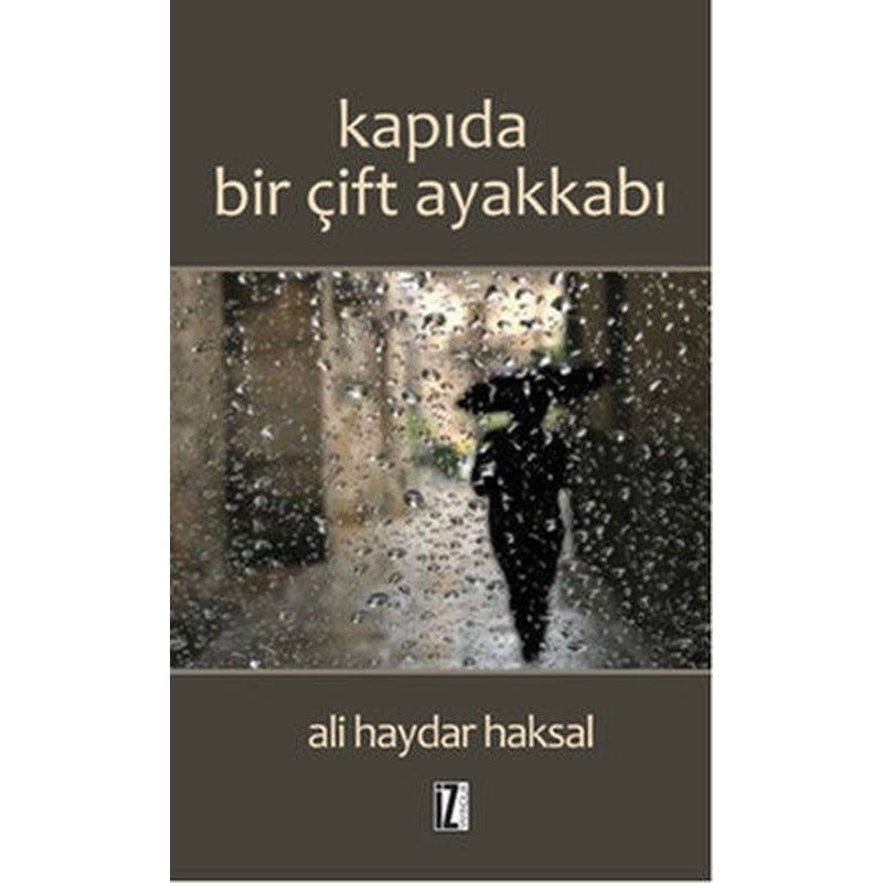 Kapıda Bir Çift Ayakkabı | İz Yayıncılık