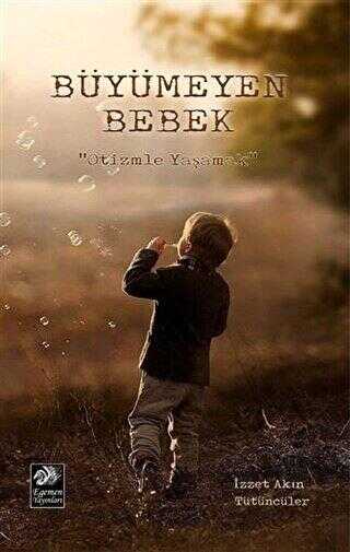 Büyümeyen Bebek - İzzet Akın Tütüncüler kitap kapağı
