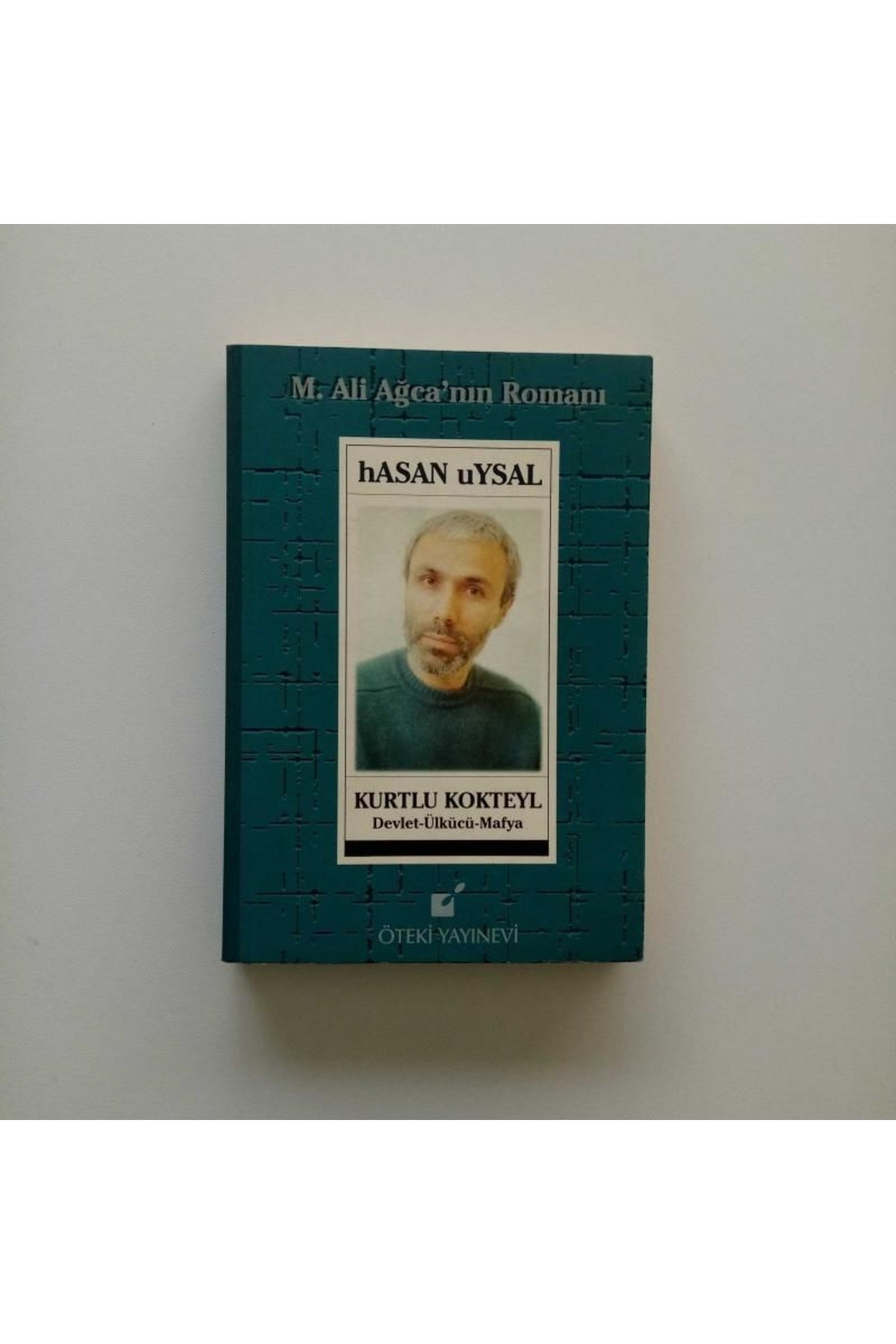 M.Ali Ağca'Nın Romanı Kurtlu Kokteyl - HASAN UYSAL kitap kapağı