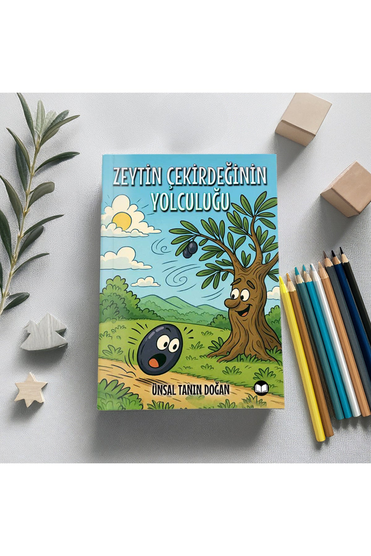 Zeytin Çekirdeğinin Yolculuğu - Ünsal Tanın Doğan kitap kapağı